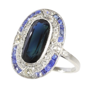 Vintage Art Deco Elegance: Sapphire and Diamond Ring with a Passionate Past